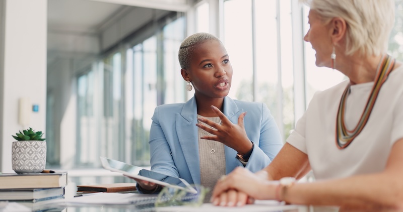Two business leaders discussing conservation